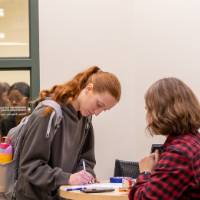 Students signing in for day of service